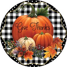 a black and white checkered pattern with pumpkins, leaves and the words give thanks