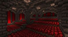 an empty room with rows of red seats