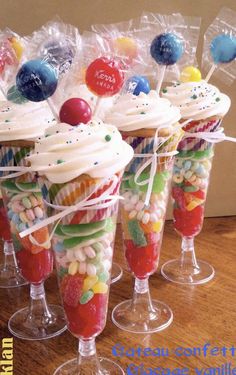 candy filled wine glasses with candies in them