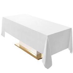 a white tablecloth on a gold stand