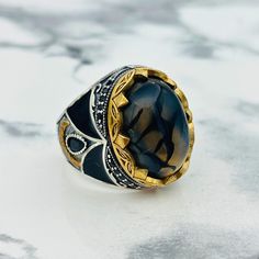 Crafted from genuine 925 sterling silver, this ring features an oval-cut patterned yemen aqeeq stone at its center. The design combines timeless style with Ottoman influence, bringing to life a perfect balance of beauty and history. Its classic design reflects the beauty of Ottoman style and is handmade by skilled Turkish artisans who take pride in their work. The black enamel details on the edges add a lovely touch, while the yemen agate stone makes it look even more special. This ring is perfe Style Ottoman, Oval Cut Ring, Ottoman Styling, Ziplock Bags, Gift For Husband, Ring Oval, Yemen, Men's Ring, Silver Pieces