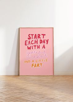 a pink poster with the words start each day with a grateful moment and a little fart