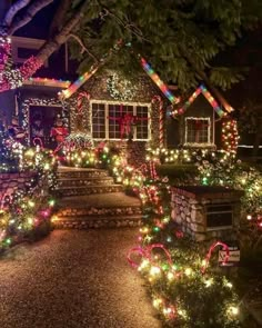 a house covered in christmas lights and decorations