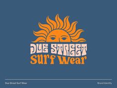 the logo for blue sunset surf wear, which features an orange sun and text that reads due