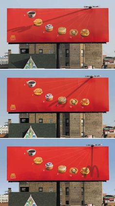 three billboards with donuts on them in front of a building and the words mcdonald's