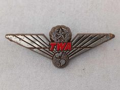 a badge with the word twa on it