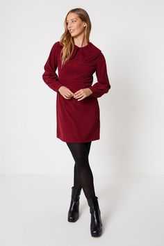 Collared neckline with pretty ruffled detail   Bishop sleeves with matching ruffled cuffs   Panelled corduroy fabric in a rich wine hue   Versatile straight shift silhouette skims the figure   Knee-length cut suits both casual and smart occasions  This wine-coloured corduroy shift dress from Oasis is a versatile wardrobe addition. Cut in a flattering straight silhouette to skim the figure, it features a collared neckline with a pretty ruffled detail that adds feminine flair. The long bishop sleeves are trimmed with matching ruffles at the cuffs for a girly finish. Panelled construction and medium-weight corduroy fabric lend visual interest and movement. Pair this dress with loafers or brogues for a smart daytime look. For evenings out, match it with heeled ankle boots and a leather jack Dress With Loafers, Christmas Party Shoes, Oasis Dress, Velvet Clothes, Sequin Outfit, Christmas Party Outfits, Short Summer Dresses, Oasis Fashion, Versatile Wardrobe