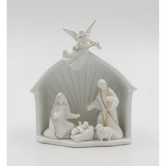 a nativity scene with the birth of jesus in white and gold, on a white background