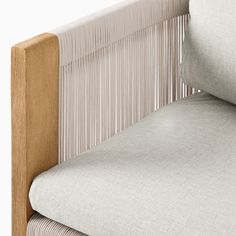 a close up view of the back of a chair with pleated fabric on it