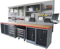 a large workbench with lots of tools on it