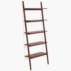 a wooden ladder shelf with three shelves on each side