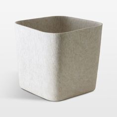 a white square container sitting on top of a table