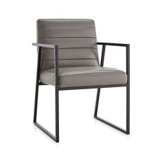 a gray leather chair with metal frame and armrests on an isolated white background