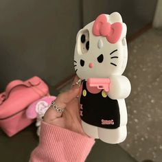 a hello kitty cell phone case with a pink bow