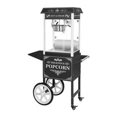 an old fashioned popcorn machine with wheels