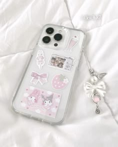 an iphone case with various stickers on it