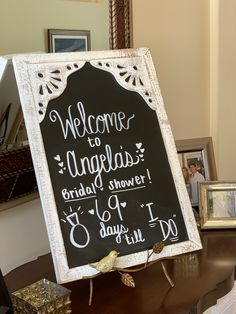 a welcome sign is displayed on a table