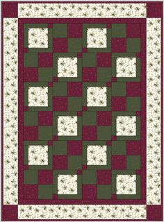 a green and red quilt with white squares on the bottom, and one block in the middle