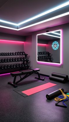 a gym room with exercise equipment and neon lights on the wall, along with yoga mats