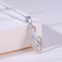 New! Treble Clef Musical Pendant Necklace. For The Music Lovers! Pendant Is About 1 Inch Tall. 18" Chain Length. Style # Cute Jeweled Rhinestone Cz Cubic Zirconia Silver Classy Everyday Dainty Delicate Music Note Symbol Concert Pianist Musician Singer Feminine Romantic Everyday All Seasons Trendy Music Note Symbol, Music-themed Pendant Jewelry As Gift, Silver Music-themed Necklace For Gift, Music-themed Pendant Jewelry For Gifts, Spiderman Outfit, Music-themed Silver Pendant Necklace, Concert Pianist, Sterling Silver Music-themed Pendant Necklace, Lariat Necklace Silver