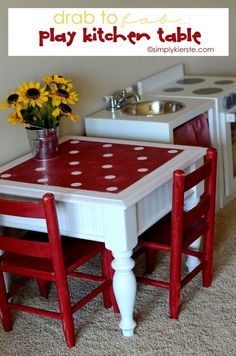 a red and white kitchen table with four chairs