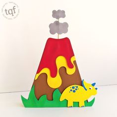 a paper hat with an image of a giraffe and rhinoceros on it