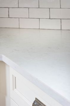 a white counter top in a kitchen