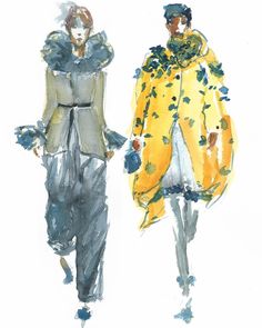 two people walking down the runway in coats and pants, one wearing a yellow coat