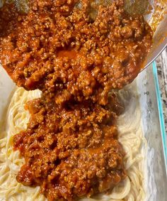 spaghetti and meat sauce in a glass dish