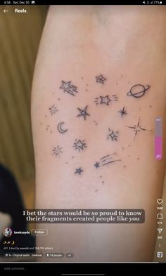 an image of stars and planets on the back of a person's arm with text below it