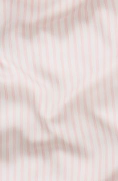 a red and white striped shirt with buttons on the front, close up view from above