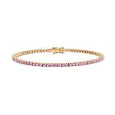 Enhance your jewelry collection with the captivating beauty of our Pink Sapphire Tennis Bracelet. Adorned with vivid pink gemstones, this exquisite piece radiates elegance and charm. Available in 14K Yellow Gold and White Gold Carat weights are reflective of a 7in bracelet. Shorter lengths will have lower carat weights that those listed. Gemstones are natural, therefore colors may vary Pink Sapphire Tennis Bracelet, Classic Pink Tennis Bracelet With Jubilee Style, Classic Pink Tennis Bracelet With Jubilee Design, Formal Pink Diamond Bracelet With 17 Jewels, Formal Pink Gemstone Tennis Bracelet, Pink Jubilee Tennis Bracelet In Classic Style, Classic Pink Tennis Bracelet, Classic Pink Bracelets, Luxury Pink Diamond Bracelet As Gift