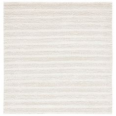 a white rug with wavy lines on it