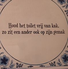 a blue and white plate with a quote on it