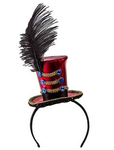 a red top hat with a feather on it