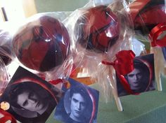 some lollipops are wrapped in plastic and have pictures on them