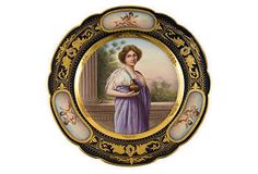 a painting of a woman in a purple dress holding a cat on a plate with gold trim