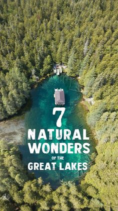 an aerial view of a lake surrounded by trees with the text 7 natural wonders on the great lakes