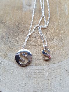 Letter S Necklace Letter Necklace Initial Necklace S Necklace Initial S Necklace Letter S Personalised Jewellery This is a listing of handmade sterling silver letter s necklace. The pendant is 21 mm in size ed in 16 or 18 inches sterling silver chain. Please see options. Necklace is available in letter s charm and the disc pedant. Item will come in a gift boxed. Similar item. https://www.etsy.com/uk/shop/flowerpecker?ref=seller-platform-mcnav&section_id=16084974 Silver Initial Pendant Necklace Nickel Free, Mother's Day Silver Initial Pendant Necklace, Silver Monogram Pendant Charm Necklace, Silver Initials Necklace For Everyday, Silver Monogram Pendant Necklace, Sterling Silver Monogram Charm Necklace With Round Pendant, Symbolic Sterling Silver Jewelry With Initials, Everyday Silver Necklaces With Initials, Silver Pendant Necklace With Monogram