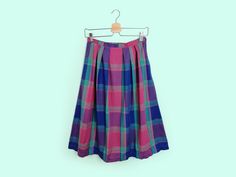 Gorgeous vintage 80's 90's high waist plaid pattern skirt, made in Slovakia. Lightweight, appears to be a cotton blend. Closure on the side with button and zipper. Excellent vintage condition. Would fit size S-M, no size tag. Please read the measurements below carefully and compare to one of your own garments, to avoid any disappointment regarding the fit. Measurements of the item, laying flat (x2 for waist and hips): - waist: 34 cm; - length: 73 cm. All our items are freshly laundered with qual Vintage Plaid Summer Skirt, Retro Plaid Cotton Skirt, Vintage Plaid Cotton Skirt, Skirt With Pleats, Pattern Skirt, Blue Pink Purple, Hem Blouse, Skirt Pattern, Full Skirt