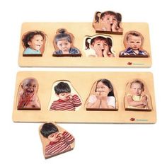 two wooden puzzles with pictures of children on them and one is missing the face