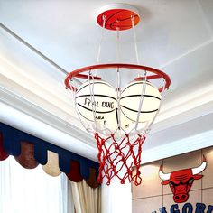 a basketball hoop hanging from the ceiling in a room with chicago bulls decorations on it