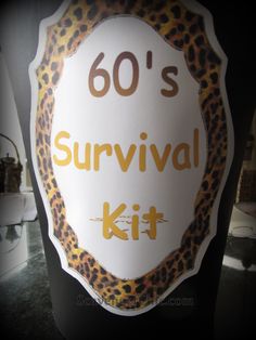 a sign that says, 60's survival kit on the side of a toilet