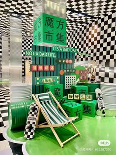 there is a green and white room with black and white checkered walls