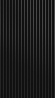 an abstract black and white background with vertical lines