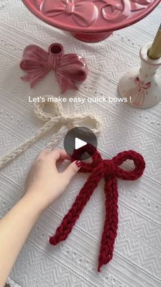 a video demonstrating how to crochet the bow for an ornament with yarn