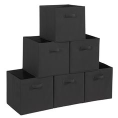 six black storage bins stacked on top of each other