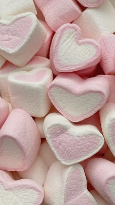 pink and white marshmallows with hearts on them