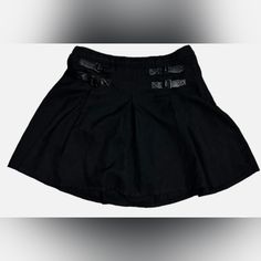 Women's Black Hot Topic Skirt With Buckles & Pleats. Size Large. Has The Plastic Price Ring, But The Price Tag Has Been Removed. Super Cute! I Have Matching Tops From Hot Topic As Well! Waist Measures 16" & Length 16". Casual Black Mini Skirt For Alternative Fashion, Black Cotton Mini Skirt For Work, Casual Black Skirt With Belt Loops, Black Grunge Skirt For Fall, Black Skort For Alternative Fashion In Spring, Black Skort For Spring Alternative Fashion, Black Grunge Skort For Spring, Rock Style Cotton Skirt For Spring, Spring Cotton Rock Style Skirt