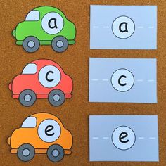 three cars with the letter e on them cut out to spell their name in different colors